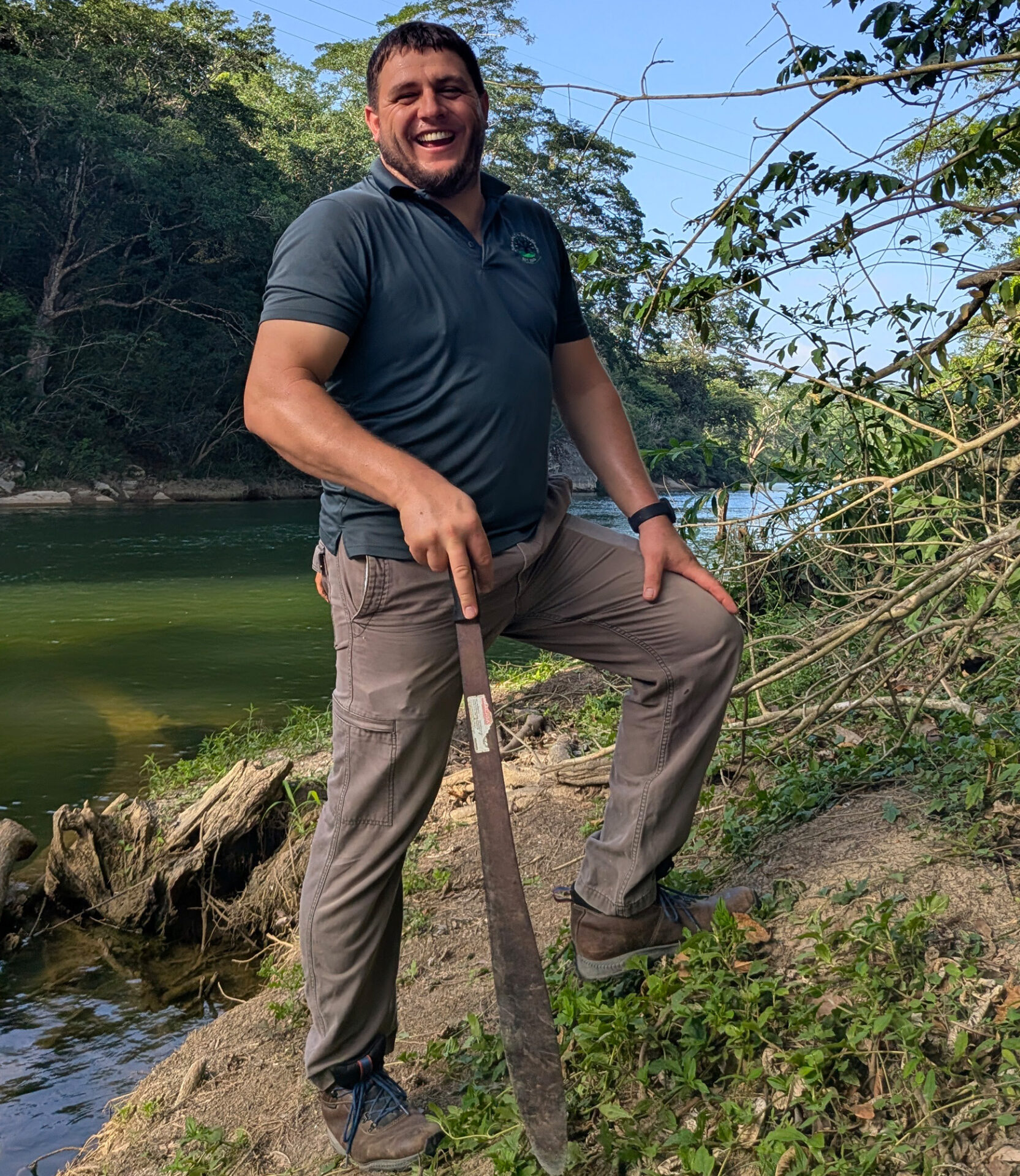 Joshua Lohr, Partner and Lead Strategist at Ceiba Realty, scouting riverfront land in Cayo District